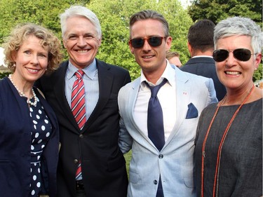 From left, Gwen Goodier with her husband, Christopher Deacon, managing director of the National Arts Centre Orchestra, and its music director, maestro Alexander Shelley, and NAC Foundation chief executive Jayne Watson at the 4th of July party hosted by the U.S. Embassy at Lornado, the official residence of the U.S. ambassador and his wife, on Monday, July 4, 2016.