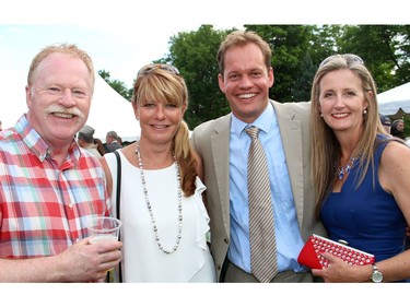 From left, Jeff Turner, vice president of Project North, with the charity's board president, photographer Michelle Valberg, and First Air V-P Bert van der Stege and Kerry Mortimer at the 4th of July party held at Lornado, the official residence of the U.S. ambassador, on Monday, July 4, 2016.