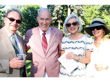 From left, Justice Michael Moldaver from the Supreme Court of Canada with Frank McArdle, executive director of the Canadian Superior Courts Judges Association, Supreme Court Chief Justice Beverley McLachlin and Riky Moldaver at  the official residence of the Italian ambassador on Tuesday, July 5, 2016, for a garden party and concert held in support of Friends of the National Arts Centre Orchestra.