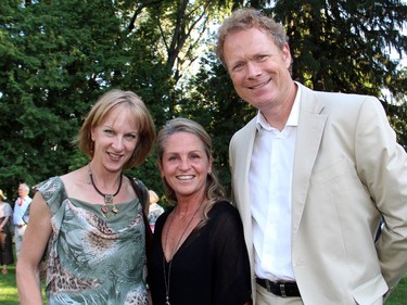 From left, Lisa Courtney Lloyd with sponsors Jane Forsyth and her husband Rob Marland, from Royal LePage Performance Realty, at a garden party for Friends of the National Arts Centre Orchestra, held at the official residence of the Italian ambassador on Tuesday, July 5, 2016.