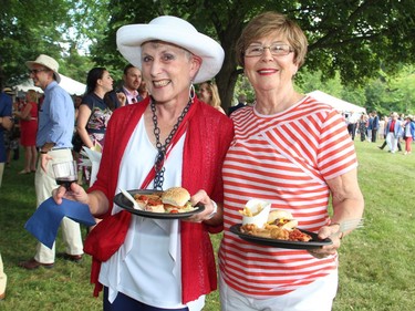 From left, Marg Campbell and pianist Evelyn Greenberg were among the thousands of guests at Lornado in Rockcliffe Park on Monday, July 4, 2016, for the U.S. Embassy's 4th of July party.