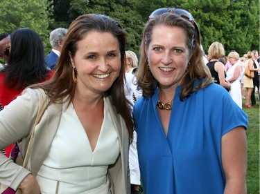 From left, Rene Filiatrault, director of communications for the Minister of National Defence, with Andrea Stairs, managing director of eBay Canada, at the 4th of July party hosted by the U.S. Embassy at Lornado, official residence of the U.S. ambassador, on Monday, July 4, 2016.