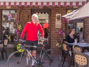 Bill Hamilton with his bike in front of the Village Bean in Merrickville. (Photo courtesy Phil Colwill)