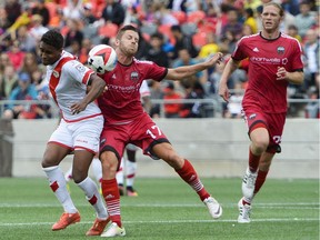 Fury FC player Carl Haworth #17 fights for the ball against Rayo OKC player Pecka #11 during the NASL match between Fury FC and Rayo OKC held at TD Stadium on Sunday, July 10, 2016.