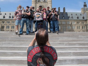 Hells Angels from Alberta pause for a photo on Parliament Hill July 23, 2016.  Ottawa Citizen Photo by Jason Ransom