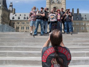 Hells Angels from Alberta pause for a photo on Parliament Hill July 23, 2016.  Ottawa Citizen Photo by Jason Ransom
