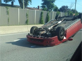 No one was injured when a car flipped on the Queensway on Monday, July 11, 2016.