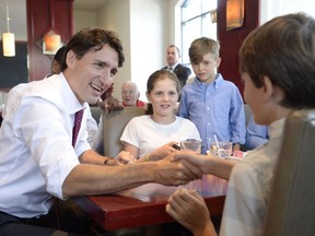 Canadian Prime Minister Justin Trudeau was happy to publicize his government's child benefit this week. Cheques started going out.