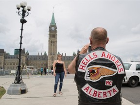 Kalie (who didn't provide a last name) from Fort McMurray, Alberta pauses for a photo on Parliament Hill July 23, 2016.