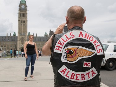 Kalie (who didn't provide a last name) from Fort McMurray, Alberta pauses for a photo on Parliament Hill July 23, 2016.  Ottawa Citizen Photo by Jason Ransom