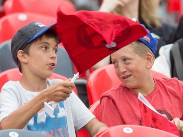 Kids in the stands get into the spirit.