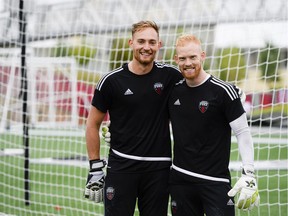 (L-R) Fury FC second and third goalkeepers Marcel DeBellis and Andrew MacRae pose for a photo after practice at TD Stadium on Saturday, July 9, 2016.
