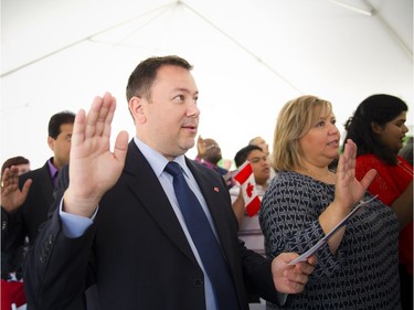 L-R: Olimpiu Samsodan and Andreea Birsila at the Canadian Citizenship ceremony held on Canada Day at the Bytown Museum in Ottawa, Friday, July 1, 2016.