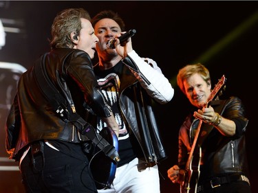 Duran Duran's Simon Le Bon, bass player John Taylor and guitarist Dominic Brown perform on the City stage.