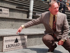 Lee Valley Tools owner Leonard Lee jokingly points to his name that was installed on the World Exchange Plaza "Plaza of Honour" steps when he was named 1998 Business Person Of The Year.