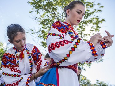 Marta Kostiw, left, and Mar'iana Bakowm, both members of the Barvinok Ukrainian Dance School, get ready to perform at the Capital Ukrainian Festival at the Ukrainian Catholic Shrine in Ottawa on Friday.