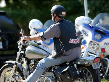 Members of the Hells Angels get checked by police at one of two checkpoints near their clubhouse in Carlsbad Springs Friday, July 22, 2016.