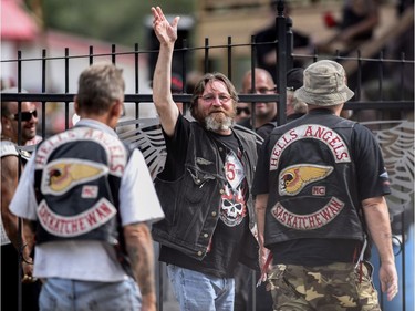 Members of the Hells Angels ride outside the Hells Angels Nomads compound during the group's Canada Run event in Carlsbad Springs, Ont., near Ottawa, on Saturday, July 23, 2016.