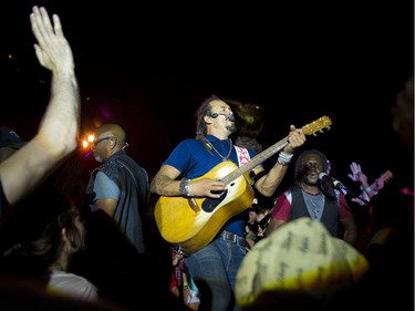 Michael Franti and Spearhead came out and performed on a tiny riser in the crowd.