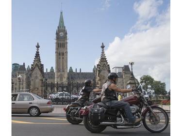 Motorcyclists wearing Gate Keepers patches visit Parliament Hill July 23, 2016.  Ottawa Citizen Photo by Jason Ransom