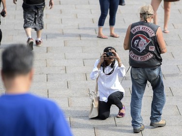 Motorcyclists wearing Gate Keepers patches visit Parliament Hill July 23, 2016.