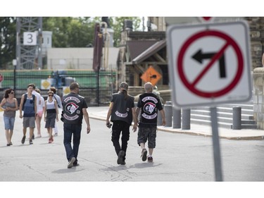 Motorcyclists wearing Gate Keepers patches visit Parliament Hill July 23, 2016.