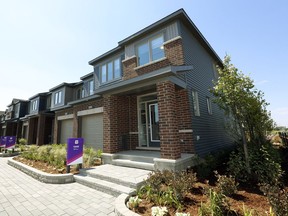 Minto has opened three new executive townhome models at its thriving Avalon Encore development in Orleans.