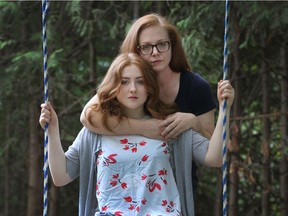 Madeleine Anderson and her mother, Lynne, outside their home in Ottawa.