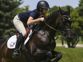 Olympian Amy Millar competes with her horse Paris at Wesley Clover in Ottawa on Thursday July 21, 2016.