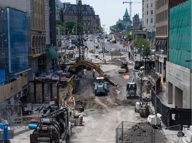 Day 13: Ongoing construction work to repair the massive sinkhole on Rideau Street in downtown Ottawa. Monday June 20, 2016.