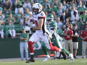 Ottawa Redblacks wide receiver Brad Sinopoli runs in a touchdown in Regina on Friday, July 22, 2016. Sinopoli had a monster first half with five catches for 156 yards and two touchdowns, but he had nothing in the second half.