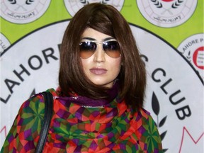 In this photograph taken on June 28, 2016, Pakistani social media celebrity, Qandeel Baloch arrives for a press conference in Lahore.  A Pakistani social media celebrity whose online antics polarised the deeply conservative Muslim country has been murdered by her brother in a suspected honour killing, officials said on July 16, prompting a wave of shock and revulsion. Qandeel Baloch, held up by many of the country's youth for her willingness to break social taboos but condemned and reviled by traditional elements, was strangled near the city of Multan, police said. /