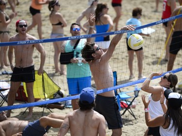 Players participate in 34th edition of Hope Volleyball Summerfest held at Mooney's Bay.