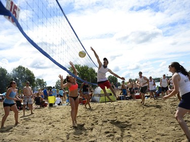Players participate in 34th edition of Hope Volleyball Summerfest held at Mooney's Bay.