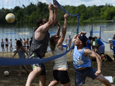 Players participate in 34th edition of Hope Volleyball Summerfest held at Mooney's Bay.