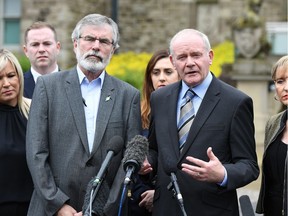 BELFAST, NORTHERN IRELAND - JUNE 24: Northern Ireland Deputy First Minister Martin McGuinness (R) and Sinn Fein President Gerry Adams (L) give their reaction to the EU Referendum vote at a press conference outside Stormont Castle on June 24, 2016 in Belfast, United Kingdom. The result from the historic EU referendum has now been declared and the United Kingdom has voted to LEAVE the European Union.