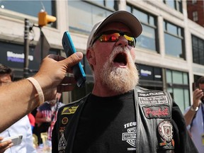 CLEVELAND, OH - JULY 19:  A man yells at liberal protesters at the the sight of the Republican National Convention (RNC) in downtown Cleveland on the second day of the convention on July 19, 2016 in Cleveland, Ohio. Many people have stayed away from downtown due to road closures and the fear of violence. An estimated 50,000 people are expected in Cleveland, including hundreds of protesters and members of the media. The four-day Republican National Convention kicked off on July 18.