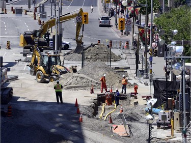 Day 12: Repairs on the Ottawa Sinkhole on Rideau St. continue Sunday June 19, 2016.