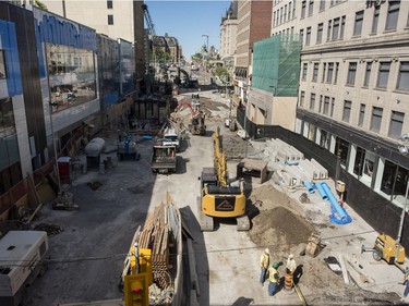 Day 14: Repairs to the Ottawa sinkhole continues on Rideau St. Tuesday June 21, 2016.