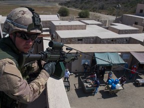 Members from the Non-Combatant Evacuation Operation group of the 2e Bataillon Royal 22e Régiment, conduct military operations in urban terrain training during RIMPAC 2016 on Camp Pendleton in San Diego, United States, on 11 July 2016.

Photo by: Sgt Marc-André Gaudreault, Valcartier imaging services
VL08-2016-0020-009