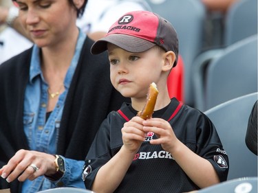 Rory Chisholm, 4, enjoys a pretzel.