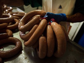 Agriculture Canada launched a counter-attack when the World Health Organization linked cancer to red meats, particularily processed meats like sausages, documents show.