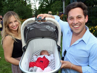 Shopify chief operating officer Harley Finkelstein and his wife, Lindsay, show off their three-week-old daughter Bayley Shayne Finkelstein, seen sleeping through the 4th of July bash held at Lornado, the official residence of the U.S. ambassador and his wife on Monday, July 4, 2016.