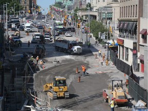 Work to repair the large Rideau Street sinkhole put the LRT project badly behind schedule.