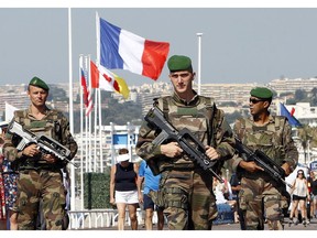 Soldiers patrol the Promenade des Anglais in Nice, southern France, this week. Dozens were killed there in last week's Bastille Day truck attack.