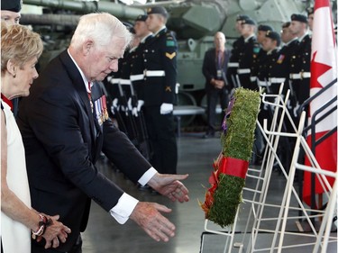Governor General David Johnston and his wife Sharon, lay a wreath in commemoration of the 100th anniversary of the Battles of the Somme and Beaumont-Hamel, at the National War Museum in Ottawa, Friday, July 1, 2016.