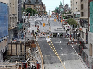 Day 22: The Rideau St sinkhole as the downtown core deals with a number street closures for the Three Amigos Summit being held at the National Gallery.