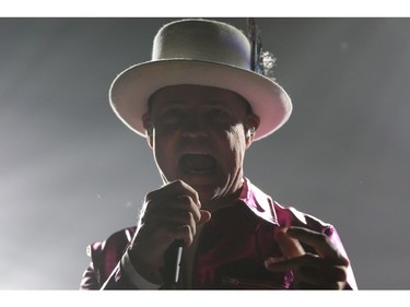 The Tragically Hip's Gord Downie, performs during the first stop of the Man Machine Poem Tour at the Save-On-Foods Memorial Centre in Victoria, B.C., Friday, July 22, 2016.