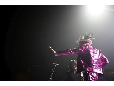 The Tragically Hip's Gord Downie, performs during the first stop of the Man Machine Poem Tour at the Save-On-Foods Memorial Centre in Victoria, B.C., Friday, July 22, 2016.