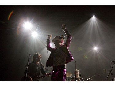 The Tragically Hip's Gord Downie, performs during the first stop of the Man Machine Poem Tour at the Save-On-Foods Memorial Centre in Victoria, B.C., Friday, July 22, 2016.